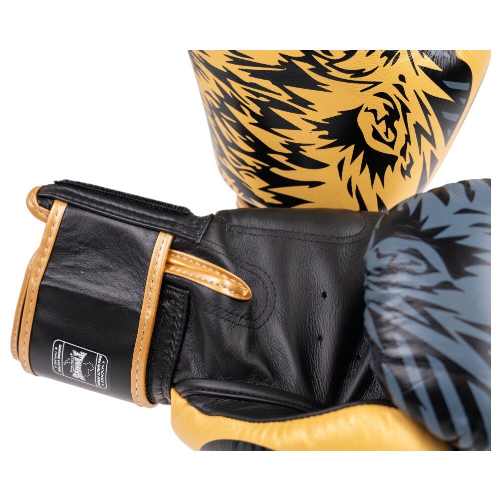 Twins Gold Wolf Boxing Gloves at FightHQ